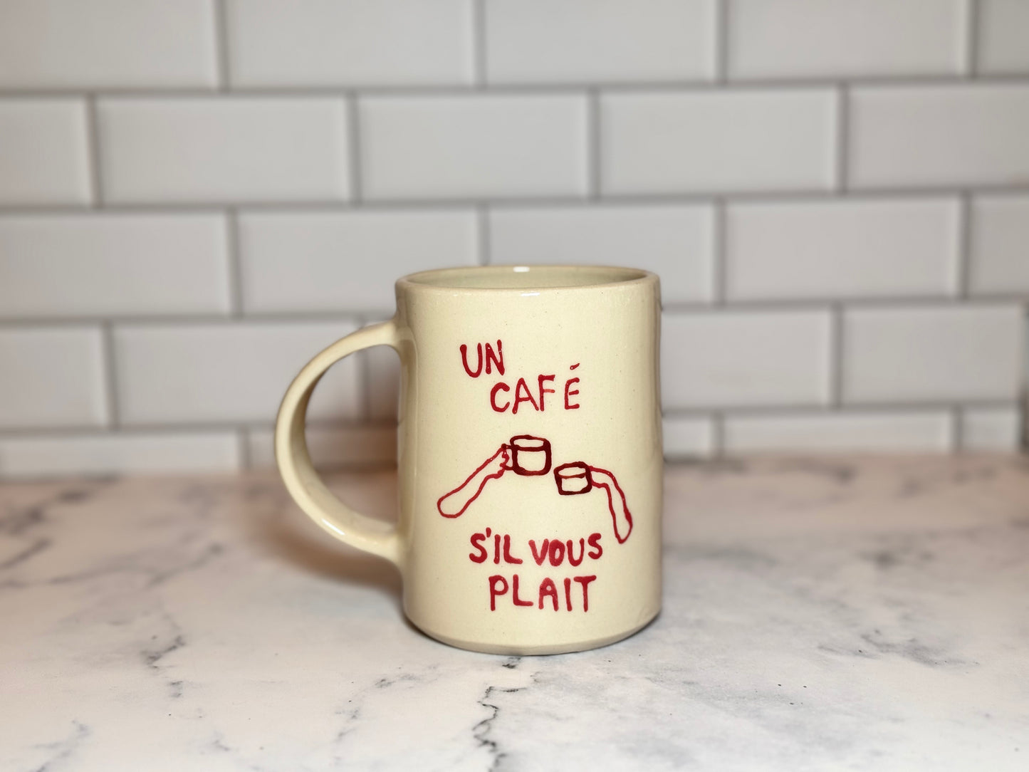 Un Café S'il Vous Plait