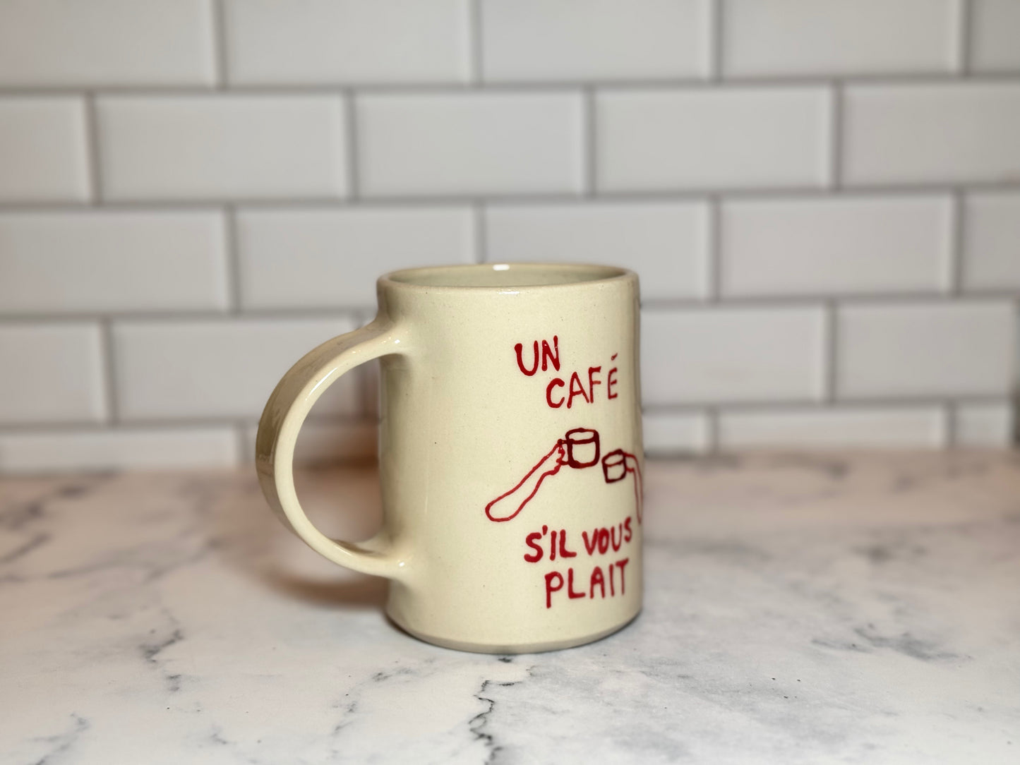 Un Café S'il Vous Plait
