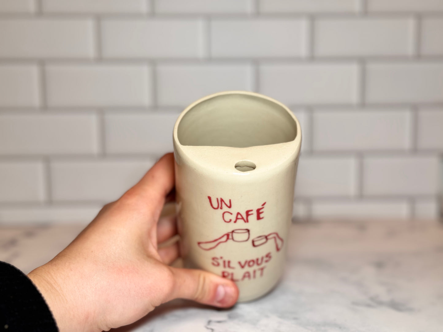 Un Café S'il Vous Plait