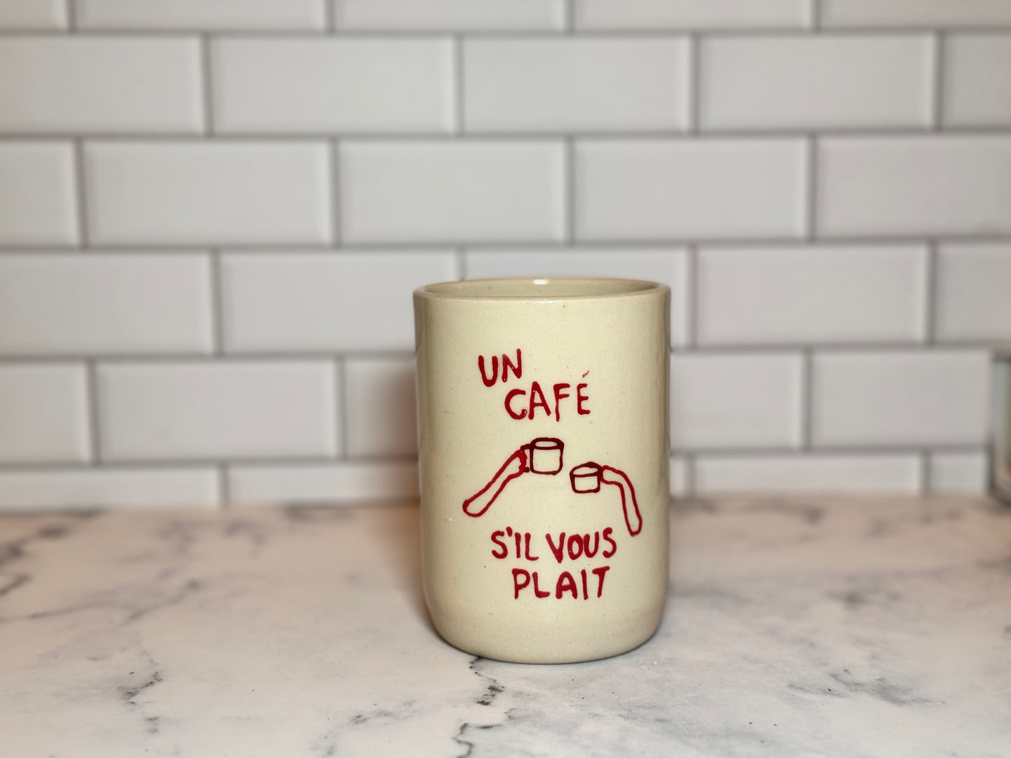 Un Café S'il Vous Plait
