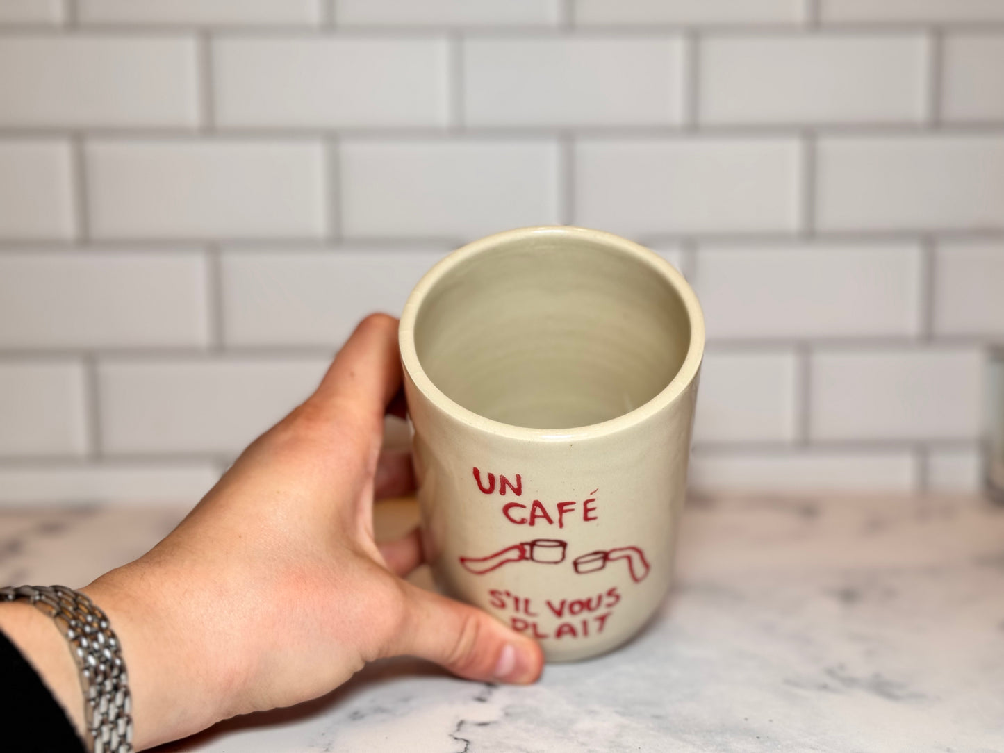 Un Café S'il Vous Plait